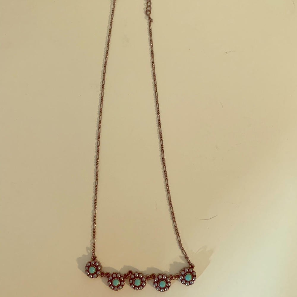Silver necklace with turquoise flowers